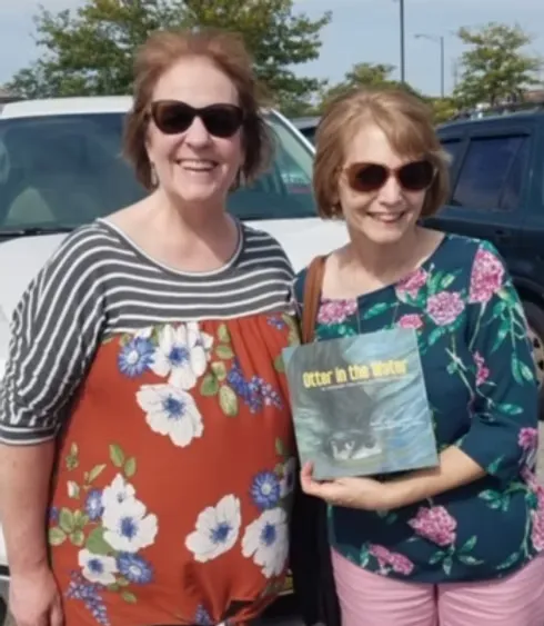 Julie and Susan with an otter